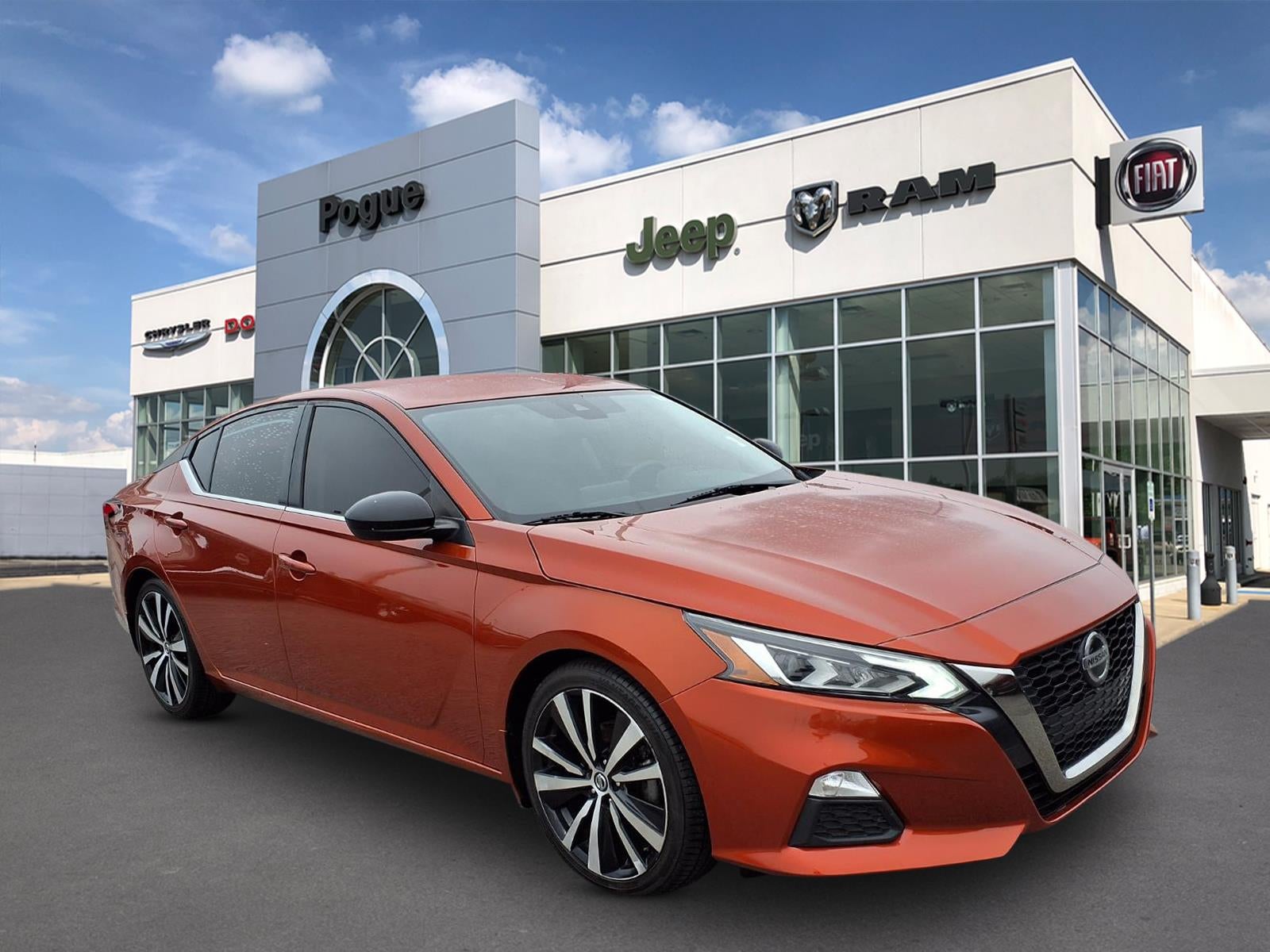 2022 Nissan Altima SR FWD in Orange — front three-quarter view