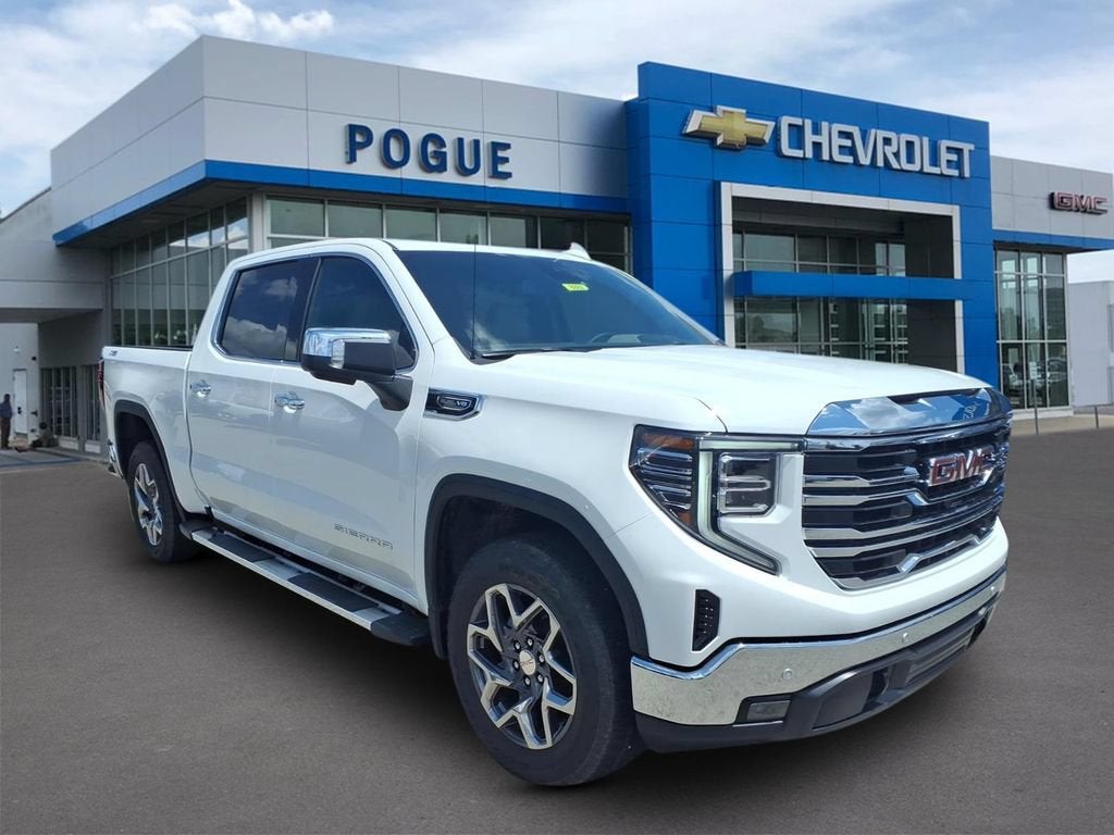 2026 GMC Sierra 1500 SLT in Summit White — front three-quarter view