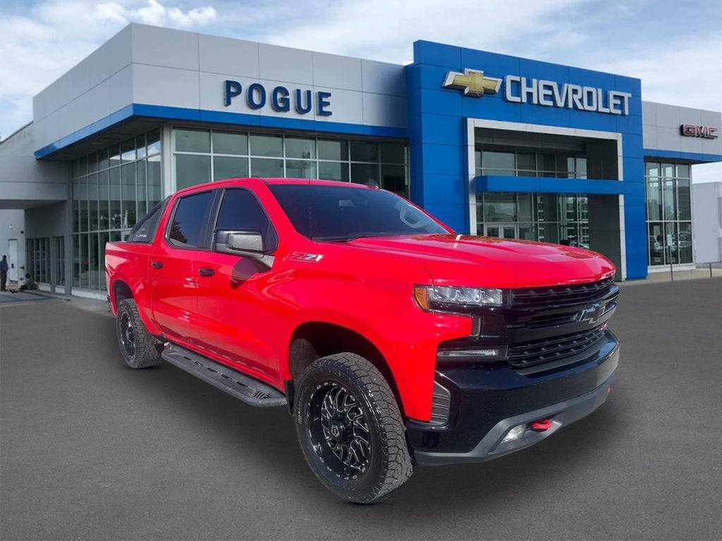 2019 Chevrolet Silverado 1500 LT Trail Boss in Red Hot — front three-quarter view