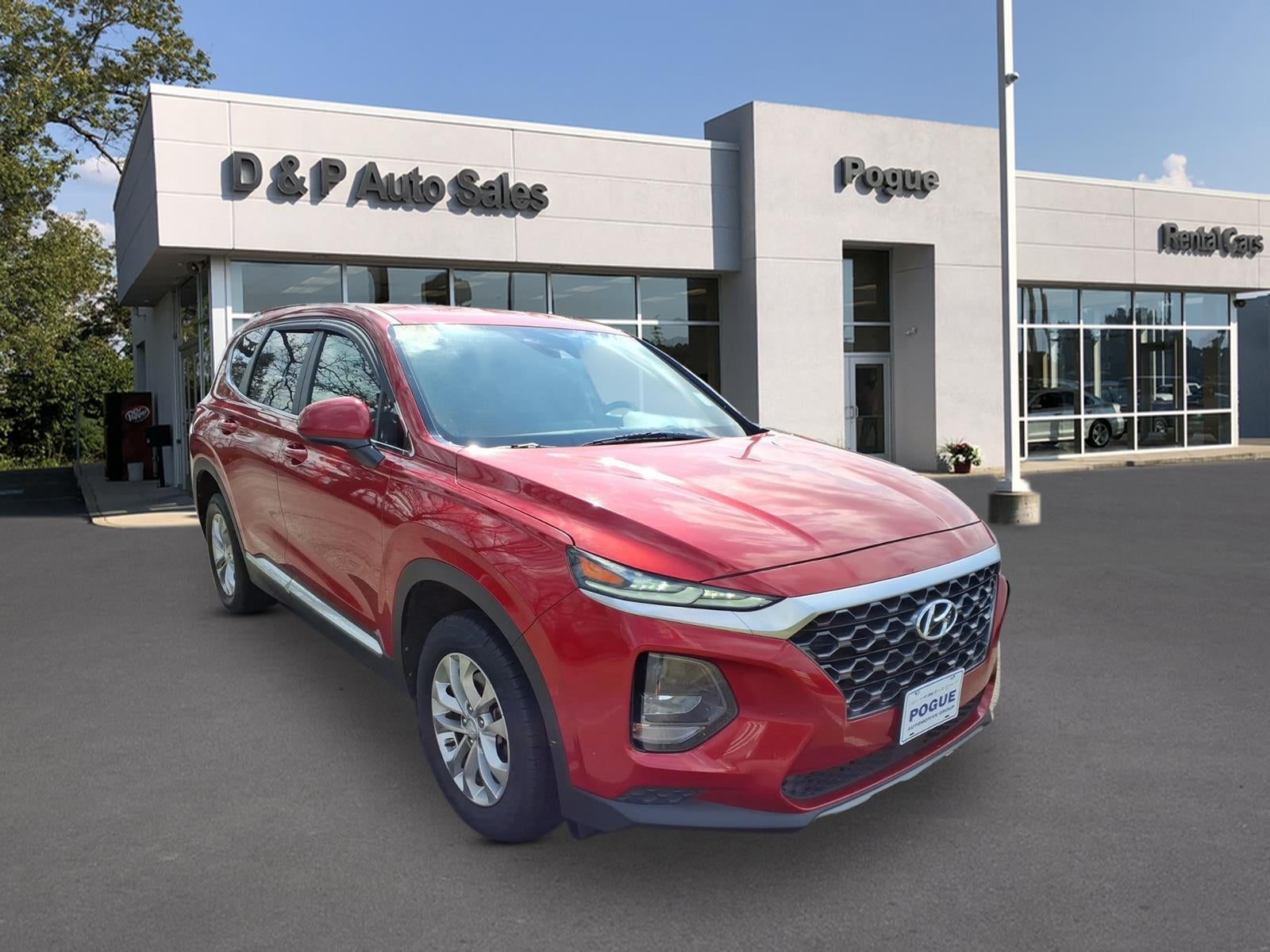 2019 Hyundai Santa Fe SE in Scarlet Red — front three-quarter view